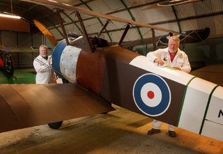 Figure 7: Stow Maries Staff preparing a Sopwith Camel for flight Ops.